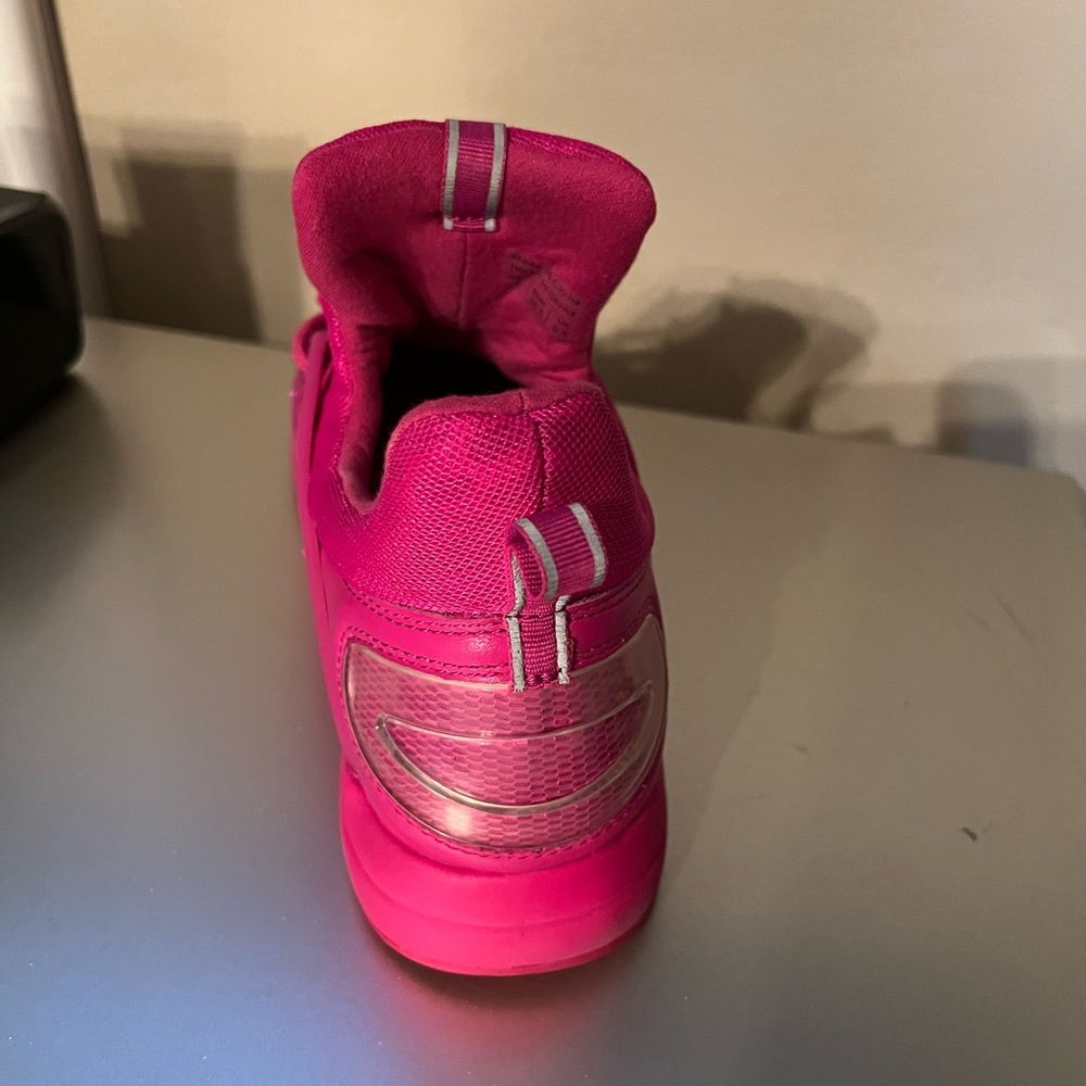 Ladies Aldo  fashion sneakers in hot pink.